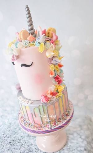 Blush colour Unicorn cake with watercoloured base