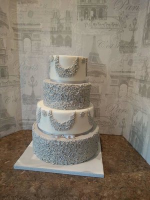 Elegant grey embossed and swags