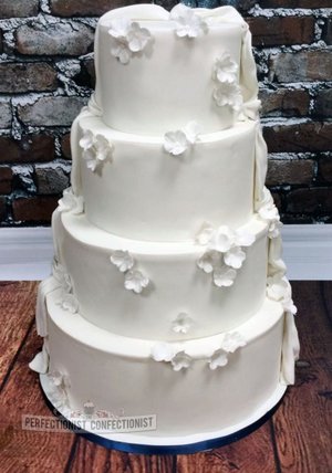 Superheroes wedding cake classic wedding cake split wedding cake half and half wedding cake marvel wedding cake wedding cake dublin 3