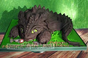 Toothless  dragon  birthday cake  birthday  cake  how to train your dragon cake  novelty  chocolate  celebration  swords  malahide  kinsealy  cake dublin  dublin   %283%29