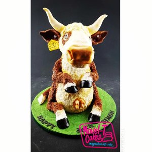 Carved cow cake