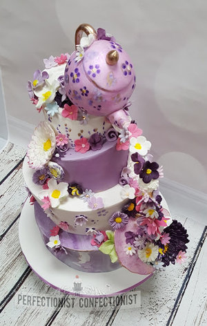 Topsy turvy  wedding cake  cake  wedding  purple  flowers  teapot  cup and saucer  chocoalte  banana  carrot cake  baileys cake  roganstown hotel  dublin %286%29