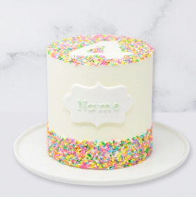 The “Sprinkles” Children’s Birthday Cake is a buttercream iced cake. The single tier is 6″ deep and 2 tier options are 10″ deep. The icing colour, number and name can be customised.
