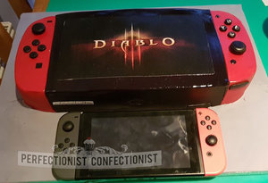 Nintendo switch cake  nintendo switch  cake  celebration  novelty  diable 3  diablo iii  demonware  dublin  swords  kinsealy  malahide  corporate cake %282%29