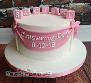 Christening cake  naming day cake  pink  white  blocks  bows  vanilla  novelty  celebration  dublin  swords  malahide  kinsealy %282%29