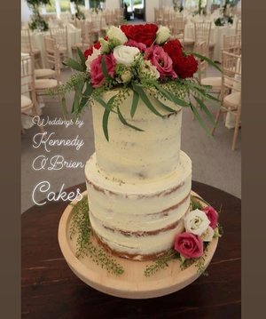 Two tier semi naked wedding cake