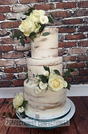 Westin hotel  wedding  christmas  naked  semi naked  wedding cake  cake  roses  greenery  elegant  cake maker  dublin  swords  malahide  kinsealy  the westin %28 %284%29